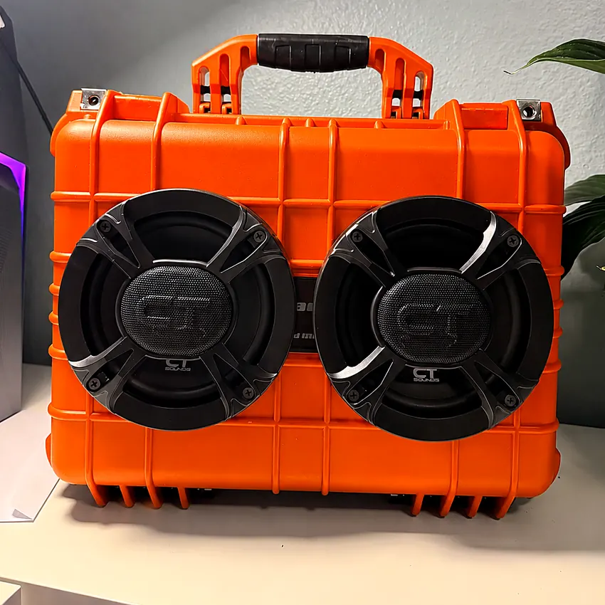 Marsh Box in an orange Apache case with two CT Sounds speakers