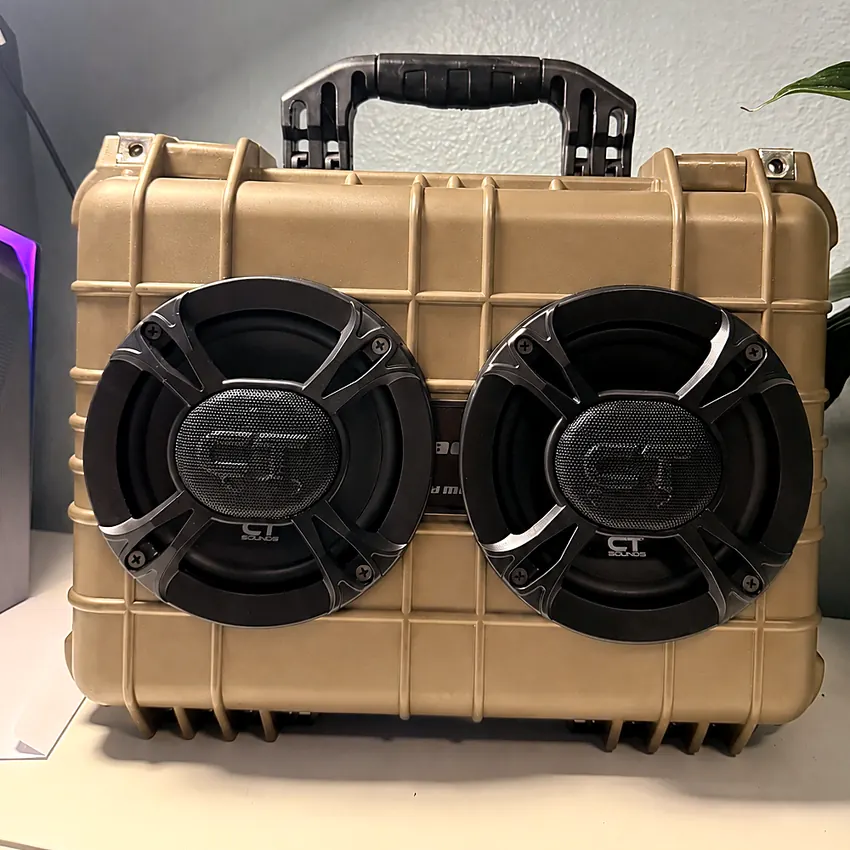 Marsh Box in a tan Apache case with two CT Sounds speakers